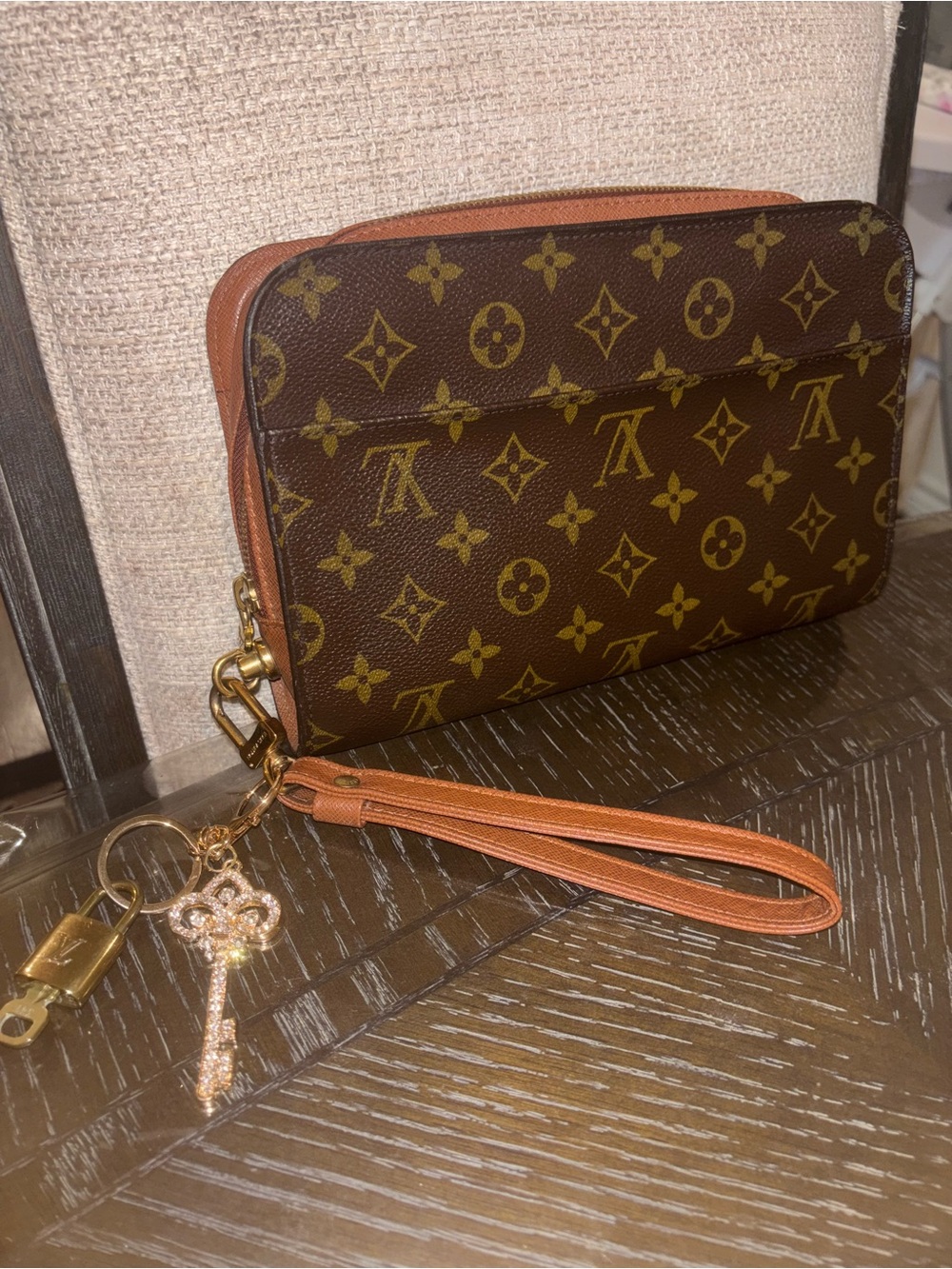 Louis Vuitton Monogram Zip Wristlet in Brown and Tan with Gold Hardware